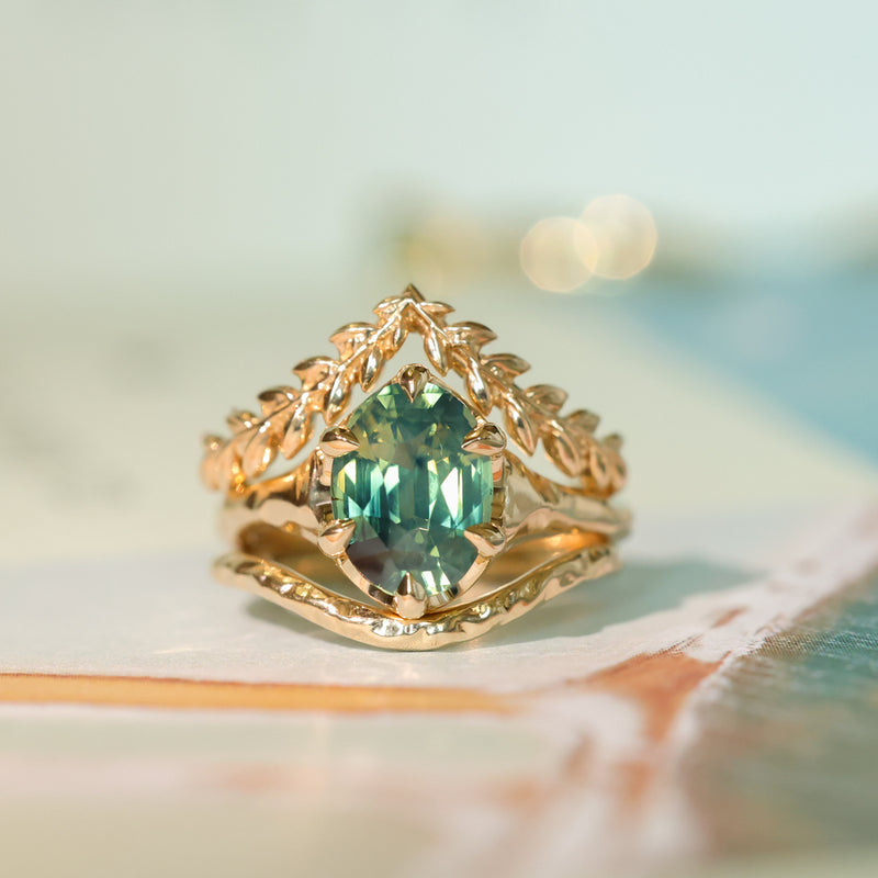 3.29ct Untreated Oval Parti Green Sapphire Low Profile 6 Prong Evergreen Carved Solitaire in 14k Yellow Gold