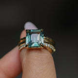 4.58ct Emerald Cut Teal Sapphire Triple Band with Diamonds and Evergreen Texture 4 Prong Low Profile Ring in 18k Yellow Gold