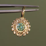 Round Precision Cut Montana Sapphire Vine Frame Bezel Set Pendants in 14k Yellow Gold