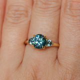 1.82ct Round Teal Precision Cut Montana Sapphire and Trillion Sapphire Low Profile Three Stone Ring in 18k Yellow Gold