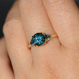 1.82ct Round Teal Precision Cut Montana Sapphire and Trillion Sapphire Low Profile Three Stone Ring in 18k Yellow Gold