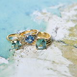 4.58ct Emerald Cut Teal Sapphire Triple Band with Diamonds and Evergreen Texture 4 Prong Low Profile Ring in 18k Yellow Gold