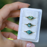 1.50ct Round Parti Yellow Blue Precision Cut Montana Sapphire and Trillion Sapphire Low Profile Three Stone Ring in 18k Yellow Gold