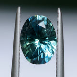 1.64CT PRECISION CUT OVAL MONTANA SAPPHIRE, MEDIUM-DEEP TEAL PARTI, 7.9X5.9MM