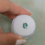 1.30CT PRECISION CUT OVAL MONTANA SAPPHIRE, CARIBBEAN TEAL, 6.8X5.6X4.2MM