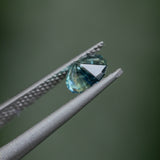 1.30CT PRECISION CUT OVAL MONTANA SAPPHIRE, CARIBBEAN TEAL, 6.8X5.6X4.2MM