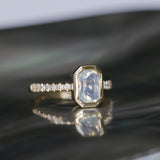 2.10ct Untreated Opalescent Radiant Cut Sapphire Low Profile Bezel Solitaire Ring with Pavé Set Diamonds in 14k Yellow Gold