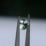1.06CT ROUND MONTANA SAPPHIRE, LIGHT PARTI YELLOW BLUE, UNTREATED, 6.1X4MM