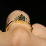 0.73ct Oval Unheated Montana Sapphire and Trillion Diamond Low Profile Ring in 14k Yellow Gold