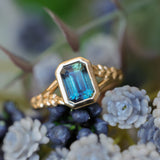 2.15ct Emerald Cut Madagascar Sapphire Wandering Vine Low Profile Bezel Split Shank Ring in 14k Yellow Gold