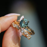 1.75ct Precision Cut Teal Oval Montana Sapphire Four Prong Evergreen Hidden Halo Solitaire in 14k Yellow Gold