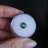 1.46CT ROUND PRECISION CUT MONTANA SAPPHIRE, TEAL GREEN, UNTREATED, 7.08X4.1MM
