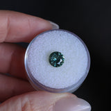 1.46CT ROUND PRECISION CUT MONTANA SAPPHIRE, TEAL GREEN, UNTREATED, 7.08X4.1MM