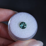 1.46CT ROUND PRECISION CUT MONTANA SAPPHIRE, TEAL GREEN, UNTREATED, 7.08X4.1MM