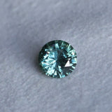 1.46CT ROUND PRECISION CUT MONTANA SAPPHIRE, TEAL GREEN, UNTREATED, 7.08X4.1MM