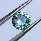 1.46CT ROUND PRECISION CUT MONTANA SAPPHIRE, TEAL GREEN, UNTREATED, 7.08X4.1MM