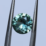 1.46CT ROUND PRECISION CUT MONTANA SAPPHIRE, TEAL GREEN, UNTREATED, 7.08X4.1MM