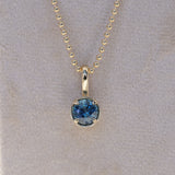1.06ct Round Blue Montana Sapphire 4 Prong Pendant in 14k Yellow Gold