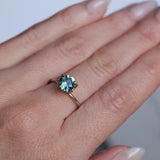 1.46CT ROUND PRECISION CUT MONTANA SAPPHIRE, TEAL GREEN, UNTREATED, 7.08X4.1MM