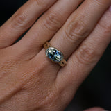 1.93ct Untreated Oval Brilliant Nigerian Parti Sapphire East-West Bezel Solitaire Alluvial Style Ring in 14k Green Gold