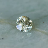 1.68CT ROUND MADAGASCAR SAPPHIRE, WHITE AND LIGHT YELLOW, UNTREATED, 7.1X4.6MM