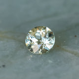 1.68CT ROUND MADAGASCAR SAPPHIRE, WHITE AND LIGHT YELLOW, UNTREATED, 7.1X4.6MM