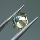 1.68CT ROUND MADAGASCAR SAPPHIRE, WHITE AND LIGHT YELLOW, UNTREATED, 7.1X4.6MM