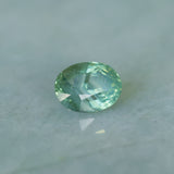 2.82CT OVAL MADAGASCAR SAPPHIRE, CARIBBEAN TEAL GREEN WITH GROWTH LINES, 8.94X6.75X5.50MM
