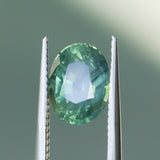 2.82CT OVAL MADAGASCAR SAPPHIRE, CARIBBEAN TEAL GREEN WITH GROWTH LINES, 8.94X6.75X5.50MM
