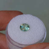 1.61CT ROUND PRECISION CUT MONTANA SAPPHIRE, LIGHT TEAL GREEN, 6.9X4.6MM