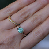 1.61CT ROUND PRECISION CUT MONTANA SAPPHIRE, LIGHT TEAL GREEN, 6.9X4.6MM