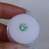 1.61CT ROUND PRECISION CUT MONTANA SAPPHIRE, LIGHT TEAL GREEN, 6.9X4.6MM