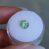 1.61CT ROUND PRECISION CUT MONTANA SAPPHIRE, LIGHT TEAL GREEN, 6.9X4.6MM