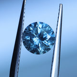 1.78CT ROUND PRECISION CUT MONTANA SAPPHIRE, LIGHTER BLUE GREY, 7.2X4.7MM