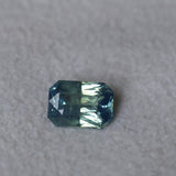 1.70CT MADAGASCAR RADIANT CUT SAPPHIRE, MEDIUM TO LIGHT TEAL BLUE GREEN, UNTREATED, 7.8X5.6X3.9MM