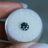 1.39CT ROUND PRECISION CUT MONTANA SAPPHIRE, COLOR SHIFTING TEAL TO PURPLE GREY, 6.5X4.3MM