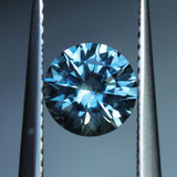 1.39CT ROUND PRECISION CUT MONTANA SAPPHIRE, COLOR SHIFTING TEAL TO PURPLE GREY, 6.5X4.3MM