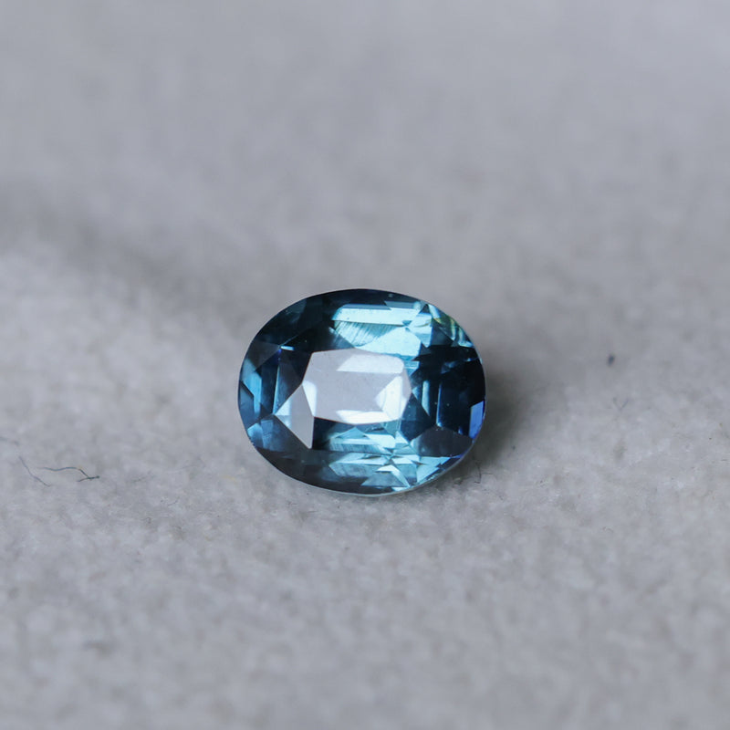 2.02CT OVAL MADAGASCAR SAPPHIRE, DEEP TEAL AND LIGHT BLUE FLASHES, UNTREATED, 7.3X6.1X5.1MM