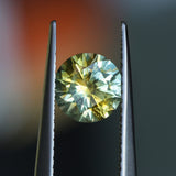 1.39CT ROUND PRECISION CUT MONTANA SAPPHIRE, BICOLOR YELLOW BLUE, 6.6X4.3MM