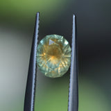 1.75CT PRECISION CUT OVAL MONTANA SAPPHIRE, EARTHY COPPER YELLOW TEAL, 7.8X6.3X4.7MM