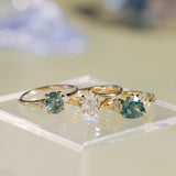 1.20ct Oval Brilliant Teal Montana Sapphire and Princess Cut Diamond Rapids Low Profile Ring in 14k Yellow Gold