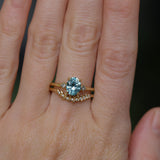 2.01ct Oval Precision Cut Denim Blue Untreated Montana Sapphire and Princess Cut Diamond Rapids Low Profile Ring in 18k Yellow Gold