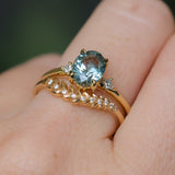 2.01ct Oval Precision Cut Denim Blue Untreated Montana Sapphire and Princess Cut Diamond Rapids Low Profile Ring in 18k Yellow Gold