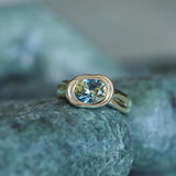1.93ct Untreated Oval Brilliant Nigerian Parti Sapphire East-West Bezel Solitaire Alluvial Style Ring in 14k Green Gold