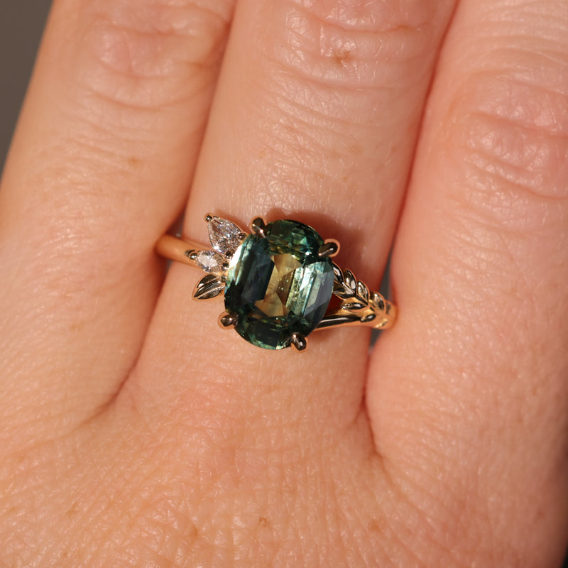 3.07ct Untreated Oval Madagascar Sapphire in Wandering Vine Low Profile 4 Prong Setting with Diamonds in 14k Yellow Gold