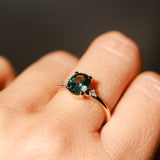 1.98ct Oval Precision Cut Teal Montana Sapphire and Princess Cut Diamond Rapids Low Profile Ring in 14k Yellow Gold