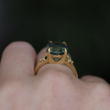 7.19ct Oval Light Teal Seafoam Madagascar Sapphire and Princess Cut Diamond Rapids Low Profile Ring in 18k Yellow Gold