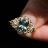 1.22ct Madagascar Geo Oval Sapphire and Diamond Floral Halo in 18k Yellow Gold