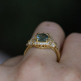 1.22ct Madagascar Geo Oval Sapphire and Diamond Floral Halo in 18k Yellow Gold