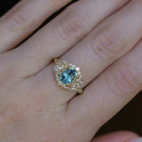 1.22ct Madagascar Geo Oval Sapphire and Diamond Floral Halo in 18k Yellow Gold